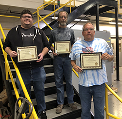 Multi-Conveyor LLC three team members with awards